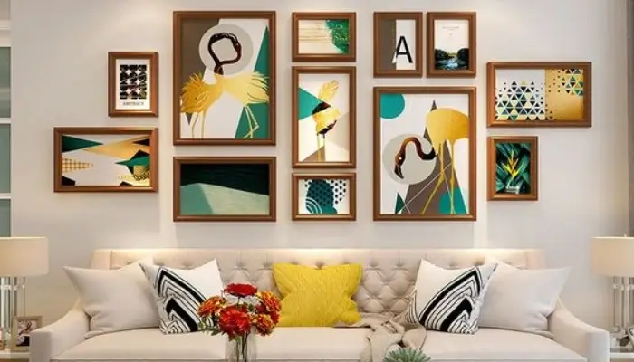 decor with picture of arts on the wall behind the sofa / How to decor Reclining sofa set ?