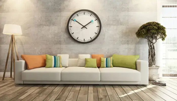 9. decor with a large clock / How to Decorate a wall above the Sofa?