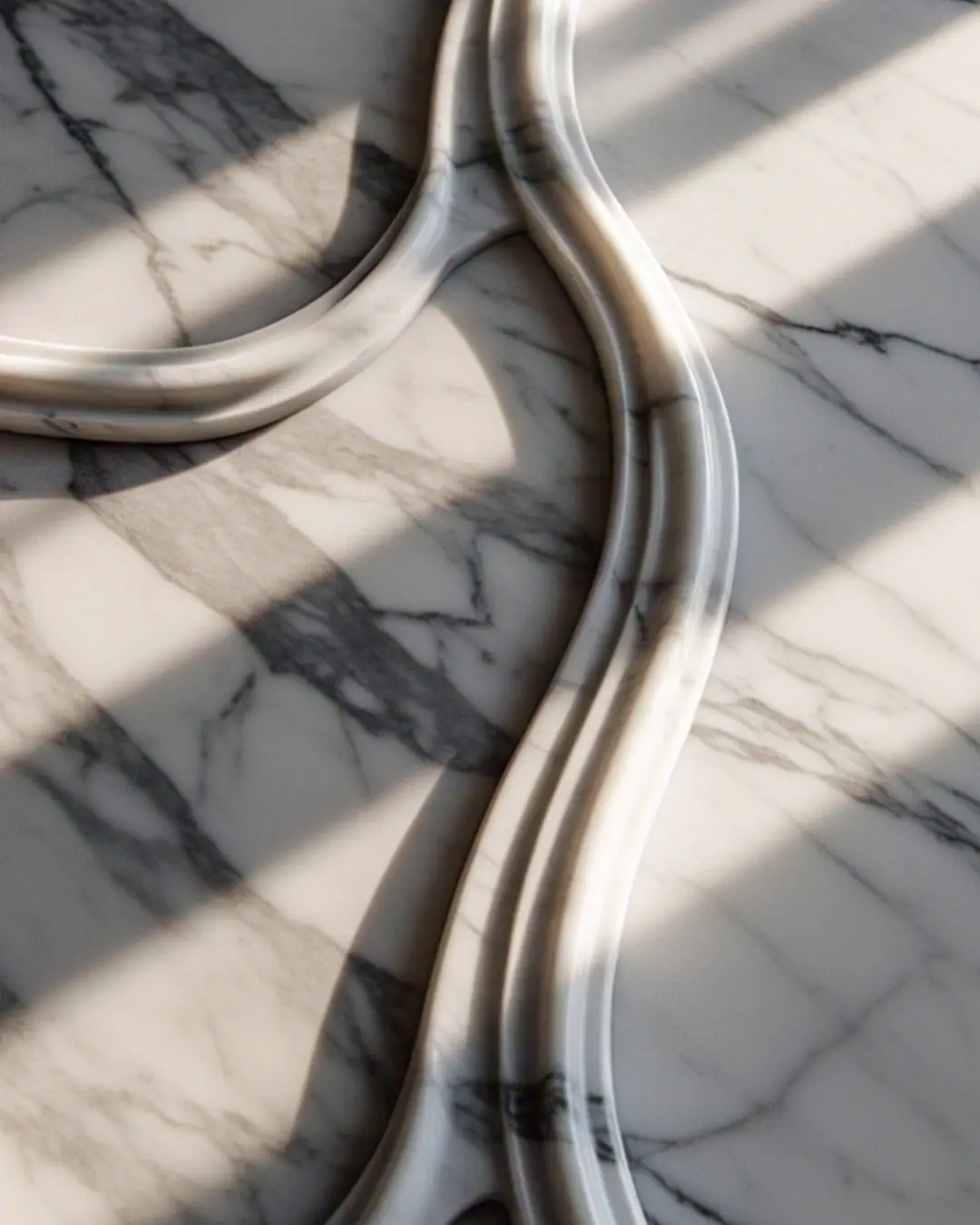Ogee Edge Countertops: The Curvy Detail That Steals the Show 2 Ogee Edge Countertop / Close-up of a marble countertop with ogee edges, showing the beautiful S-curve with sunlight making shadows on the waves.